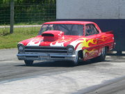 Red NOVA Drag Car with flames